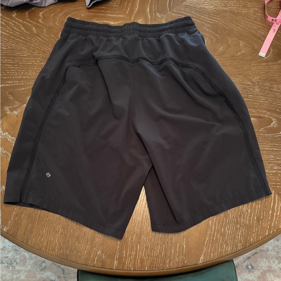 Perfect condition men’s medium black Lululemon athletic shorts no liners. 9” I.S - Picture 2 of 5